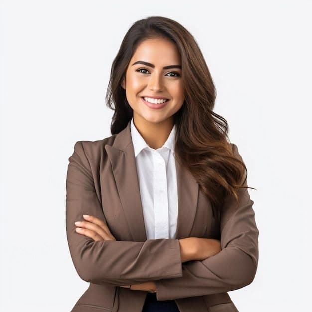 Professional freelance SEO analyst in Alappuzha smiling and standing with arms crossed in a corporate suit